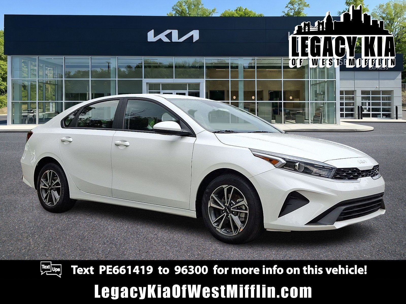 2023 Kia Forte LXS in Snow White Pearl — front three-quarter view