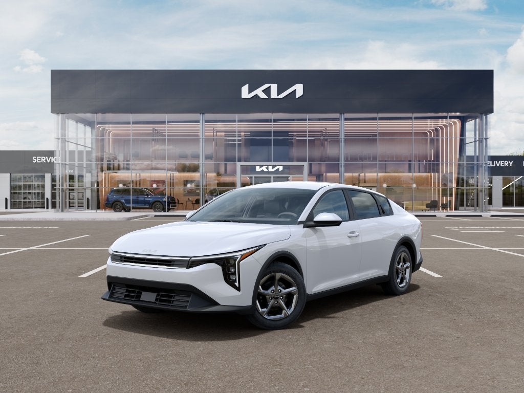 2026 Kia K4 LXS in Snow White Pear — front three-quarter view