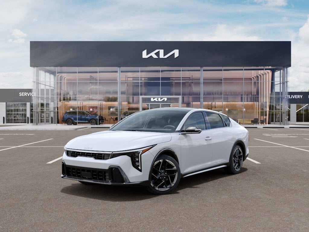 2026 Kia K4 GT-Line in Snow White Pearl — front three-quarter view